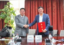 baidu09欧健集团与国内医疗保健公司国药集团签约